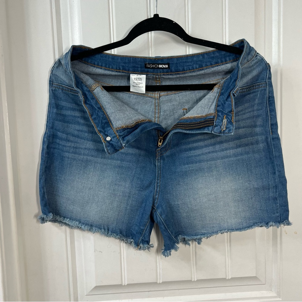 Fashion Nova casual medium wash denim shorts slightly distressed